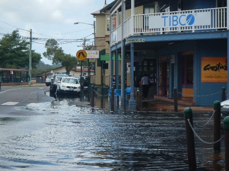 Image showing a shop front in a Woy Woy street inundated by water