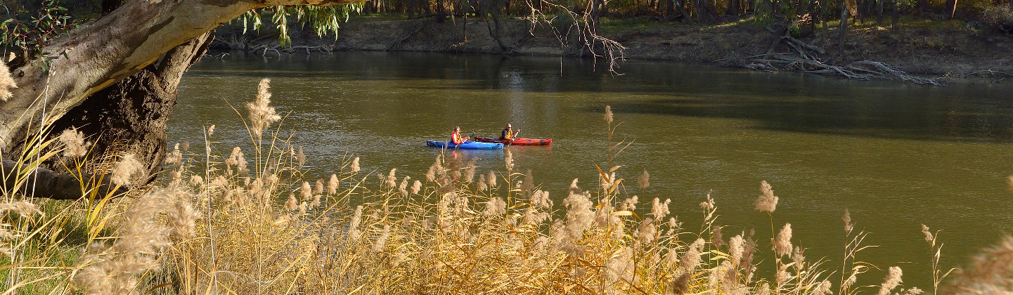 two kayakers on a river