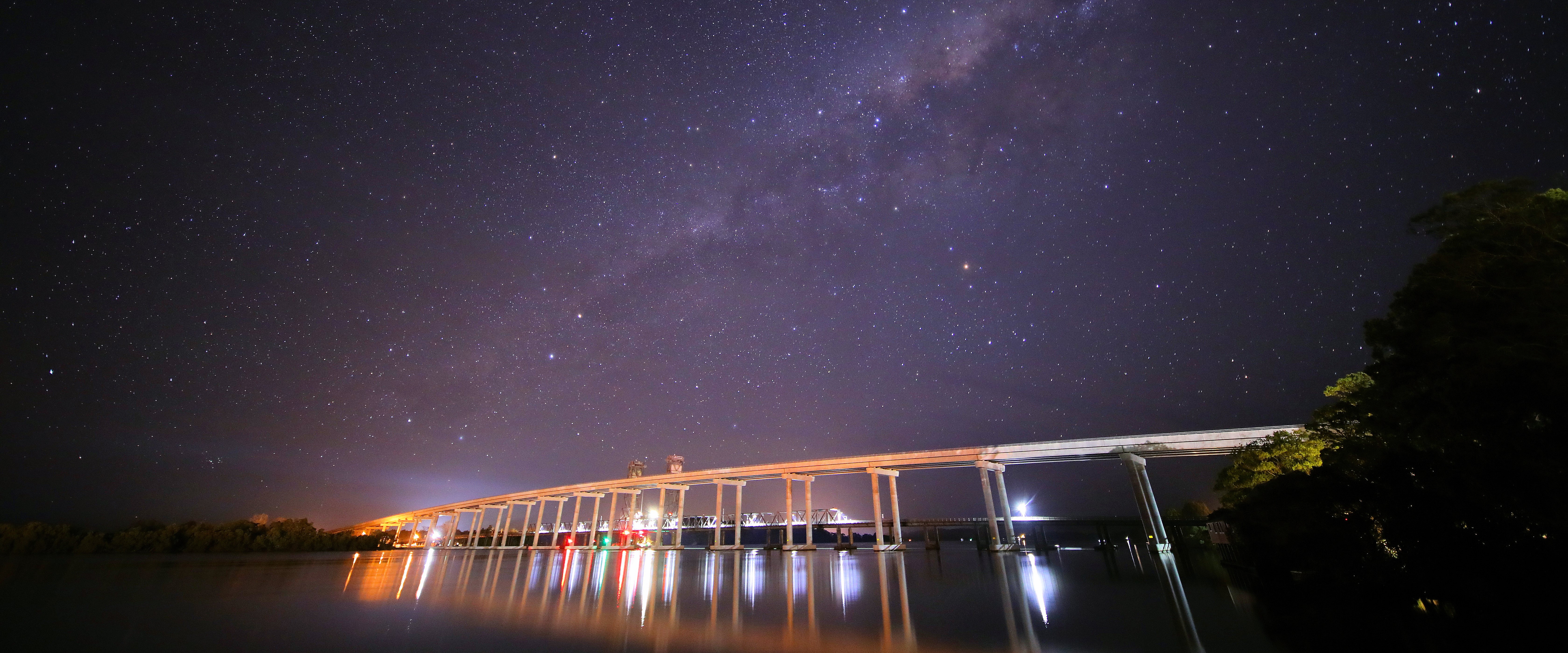 Evening night sky with new road bridge over the Clarence River at Harwood