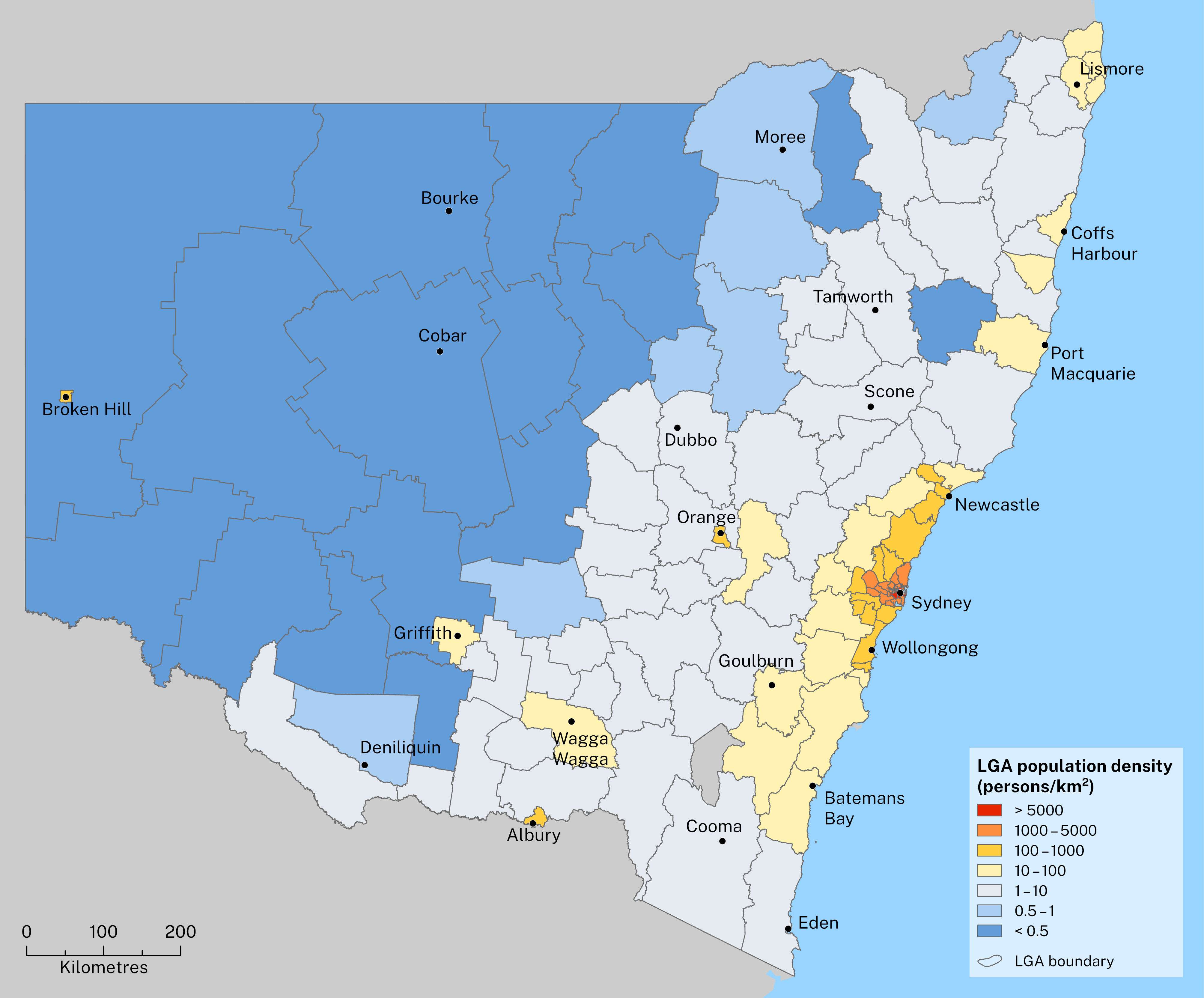 Map of New South Wales showing population density by Local Government Area (LGA) in 2023. Sydney and surrounding areas have the highest density, marked in red (>5000 persons/km²). Newcastle and Wollongong show moderate densities in orange and yellow (100–5000 persons/km²). Large rural areas, particularly in the west, are sparsely populated, indicated by dark blue (<0.5 persons/km²). LGA boundaries and major towns are labelled, with the scale indicating distances.