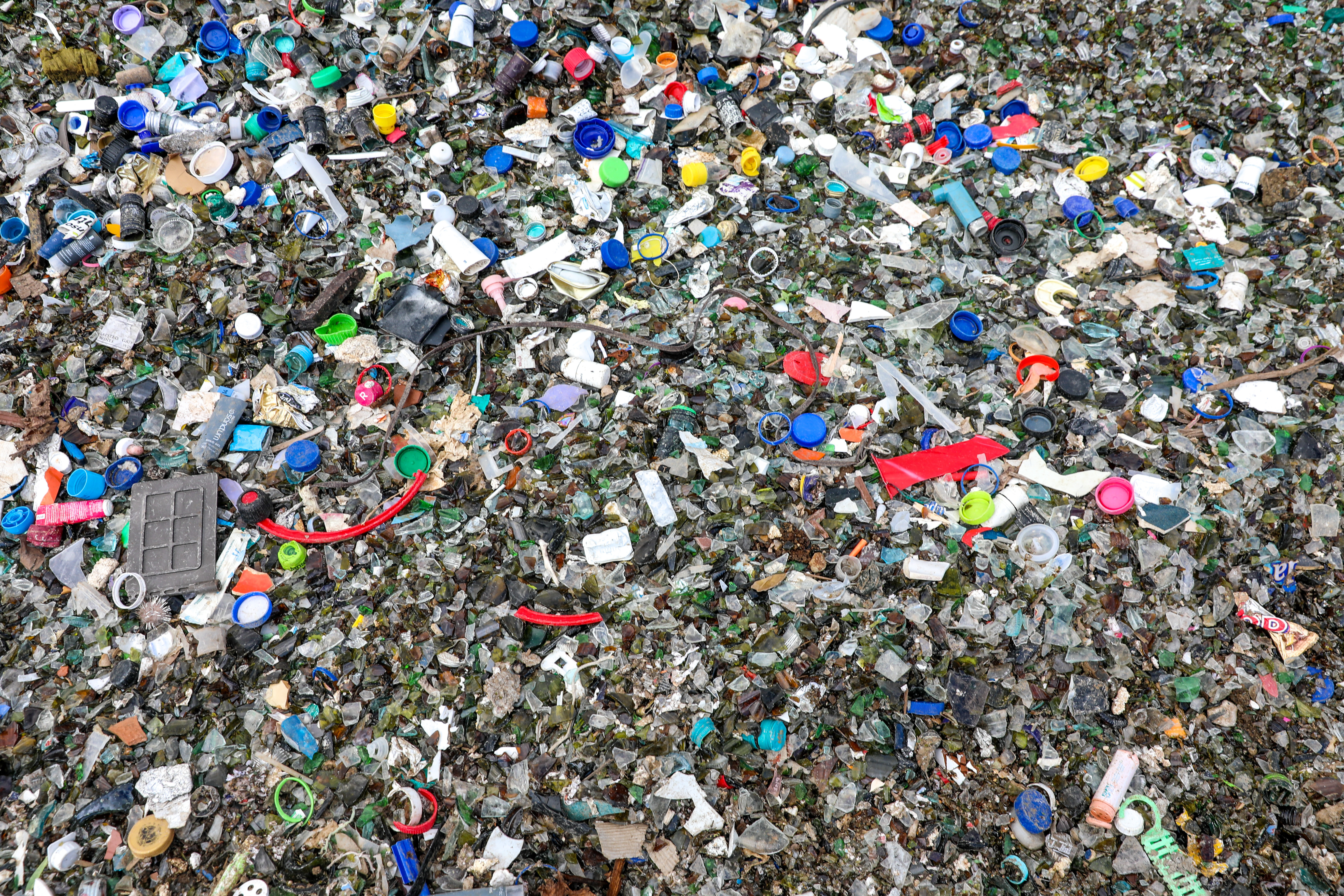 View of waste piled up at a waste sorting facility after Lismore floods